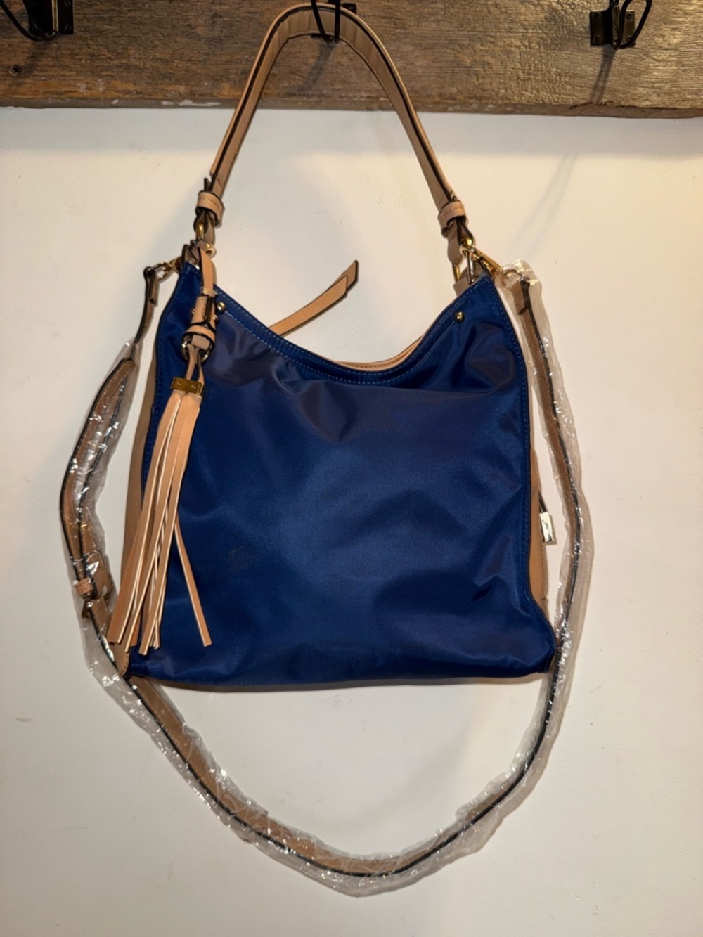 Sondra Roberts Navy Crossbody Hobo with Tan Trim and Tassel NWOT